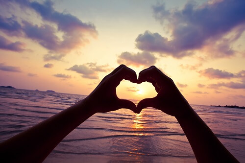 Heart-Hands-over-Sunset
